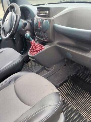 Синий Фиат Добло, объемом двигателя 1.2 л и пробегом 248 тыс. км за 3500 $, фото 6 на Automoto.ua