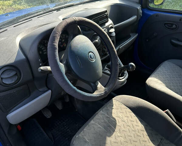 Синий Фиат Добло, объемом двигателя 1.25 л и пробегом 260 тыс. км за 2900 $, фото 6 на Automoto.ua