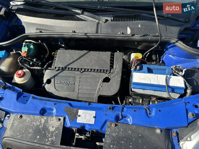 Синий Фиат Добло, объемом двигателя 1.25 л и пробегом 260 тыс. км за 2900 $, фото 3 на Automoto.ua