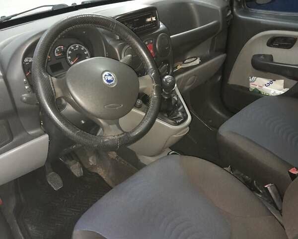 Синий Фиат Добло, объемом двигателя 1.4 л и пробегом 181 тыс. км за 3500 $, фото 9 на Automoto.ua