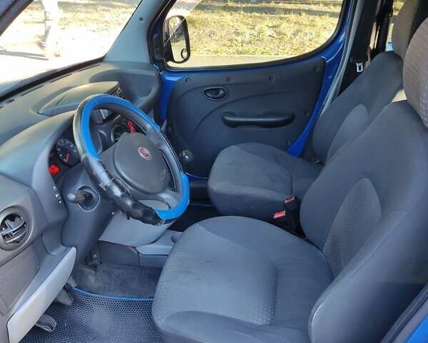 Синий Фиат Добло, объемом двигателя 1.4 л и пробегом 350 тыс. км за 3600 $, фото 4 на Automoto.ua