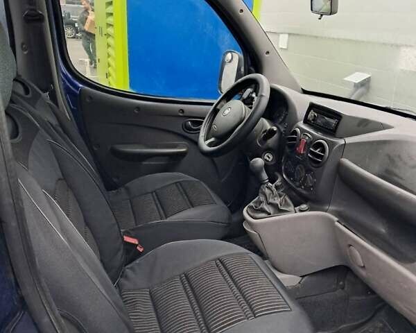 Синий Фиат Добло, объемом двигателя 1.4 л и пробегом 241 тыс. км за 4600 $, фото 4 на Automoto.ua