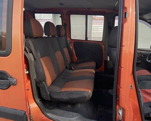 Оранжевый Фиат Добло, объемом двигателя 1.37 л и пробегом 227 тыс. км за 3800 $, фото 2 на Automoto.ua