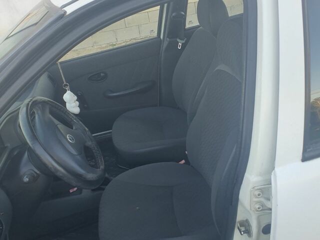 Белый Фиат Палио, объемом двигателя 1.2 л и пробегом 297 тыс. км за 1999 $, фото 8 на Automoto.ua