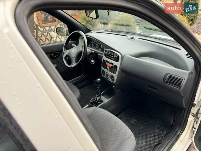 Белый Фиат Палио, объемом двигателя 1.2 л и пробегом 297 тыс. км за 1999 $, фото 13 на Automoto.ua