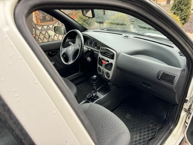 Белый Фиат Палио, объемом двигателя 1.2 л и пробегом 297 тыс. км за 1999 $, фото 3 на Automoto.ua