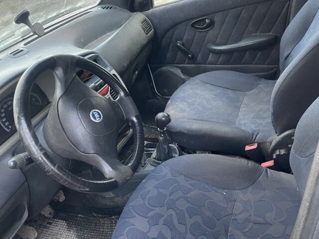 Білий Фіат Паліо, об'ємом двигуна 1.2 л та пробігом 100 тис. км за 700 $, фото 2 на Automoto.ua