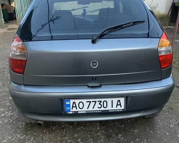 Сірий Фіат Паліо, об'ємом двигуна 1 л та пробігом 268 тис. км за 1850 $, фото 3 на Automoto.ua