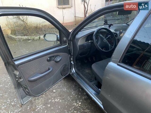Сірий Фіат Паліо, об'ємом двигуна 1 л та пробігом 268 тис. км за 1850 $, фото 6 на Automoto.ua