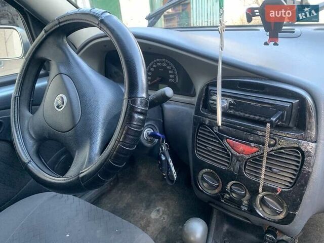 Сірий Фіат Паліо, об'ємом двигуна 1 л та пробігом 268 тис. км за 1850 $, фото 11 на Automoto.ua
