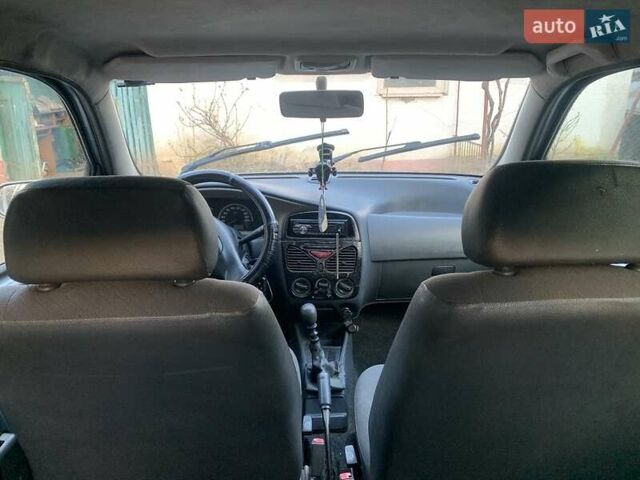 Сірий Фіат Паліо, об'ємом двигуна 1 л та пробігом 268 тис. км за 1850 $, фото 9 на Automoto.ua