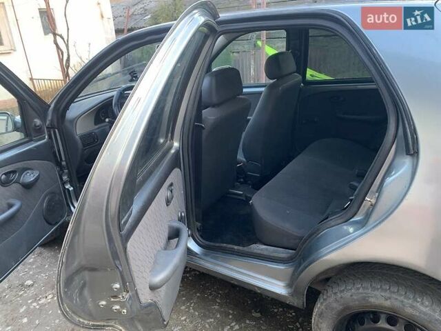 Сірий Фіат Паліо, об'ємом двигуна 1 л та пробігом 268 тис. км за 1850 $, фото 7 на Automoto.ua