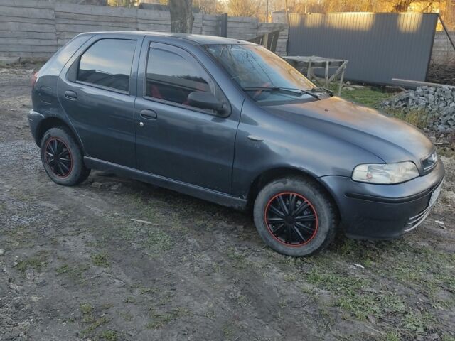 Серый Фиат Палио, объемом двигателя 1.2 л и пробегом 260 тыс. км за 1650 $, фото 2 на Automoto.ua