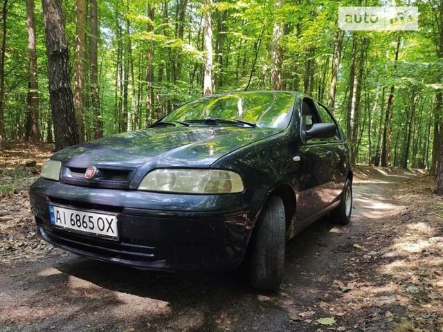 Синий Фиат Палио, объемом двигателя 1 л и пробегом 249 тыс. км за 3700 $, фото 4 на Automoto.ua