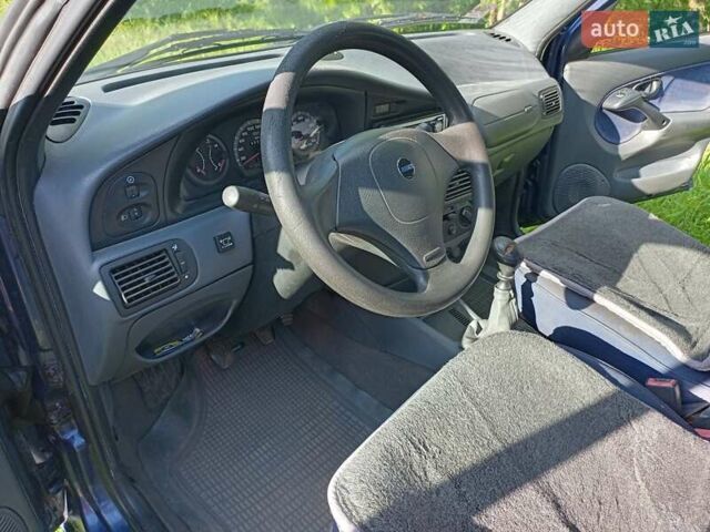 Синий Фиат Палио, объемом двигателя 1.2 л и пробегом 345 тыс. км за 1900 $, фото 5 на Automoto.ua