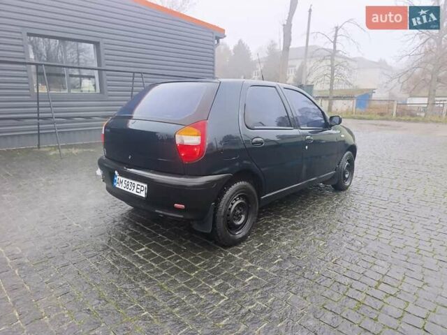 Зеленый Фиат Палио, объемом двигателя 1.3 л и пробегом 155 тыс. км за 1850 $, фото 3 на Automoto.ua