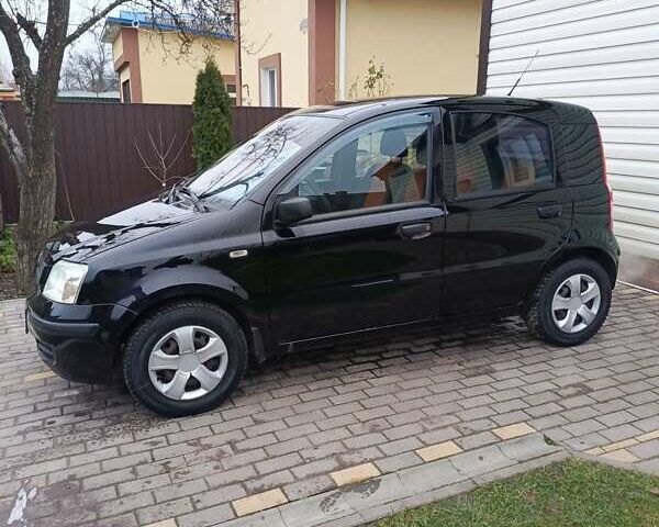 Черный Фиат Панда, объемом двигателя 1.24 л и пробегом 141 тыс. км за 4000 $, фото 34 на Automoto.ua