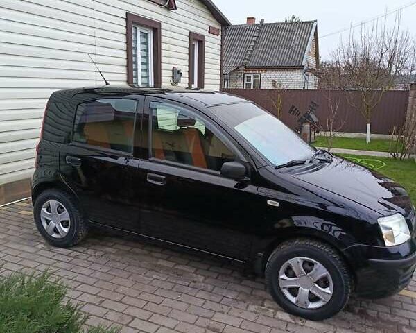 Черный Фиат Панда, объемом двигателя 1.24 л и пробегом 141 тыс. км за 4000 $, фото 28 на Automoto.ua