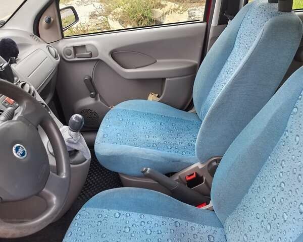 Красный Фиат Панда, объемом двигателя 1.11 л и пробегом 169 тыс. км за 3300 $, фото 5 на Automoto.ua