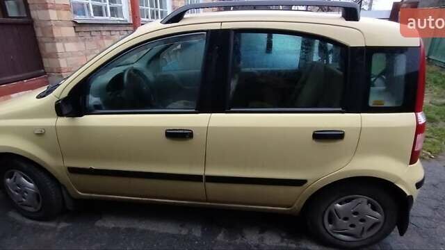 Желтый Фиат Панда, объемом двигателя 1.1 л и пробегом 160 тыс. км за 2400 $, фото 2 на Automoto.ua