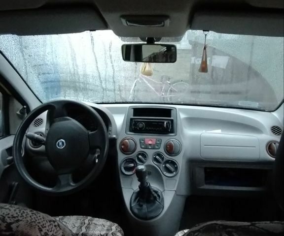 Желтый Фиат Панда, объемом двигателя 1.1 л и пробегом 160 тыс. км за 2400 $, фото 2 на Automoto.ua