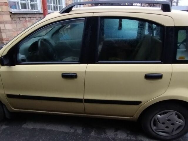 Желтый Фиат Панда, объемом двигателя 1.1 л и пробегом 160 тыс. км за 2400 $, фото 3 на Automoto.ua