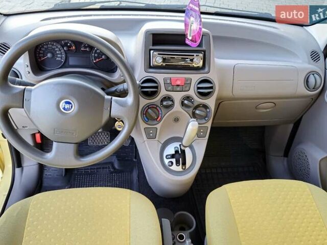 Желтый Фиат Панда, объемом двигателя 1.24 л и пробегом 147 тыс. км за 3750 $, фото 24 на Automoto.ua