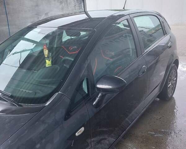 Серый Фиат Пунто Эво, объемом двигателя 1.25 л и пробегом 224 тыс. км за 4899 $, фото 8 на Automoto.ua