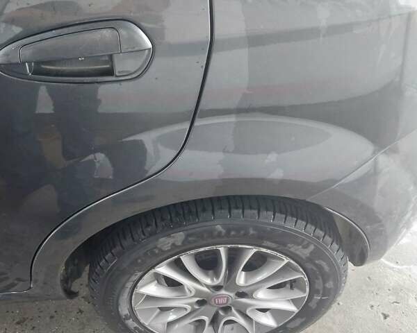 Серый Фиат Пунто Эво, объемом двигателя 1.25 л и пробегом 224 тыс. км за 4899 $, фото 3 на Automoto.ua