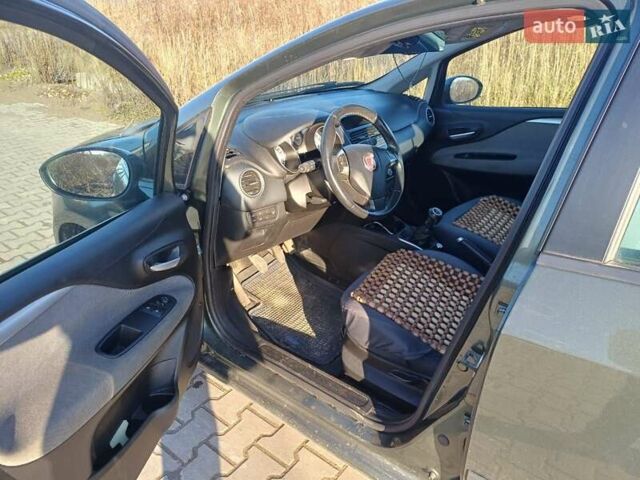 Зеленый Фиат Пунто Эво, объемом двигателя 1.37 л и пробегом 217 тыс. км за 5150 $, фото 7 на Automoto.ua