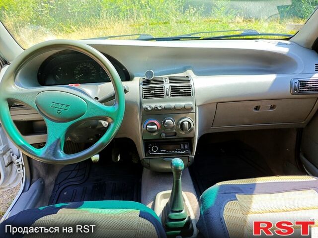 Белый Фиат Пунто, объемом двигателя 1.1 л и пробегом 411 тыс. км за 1800 $, фото 8 на Automoto.ua
