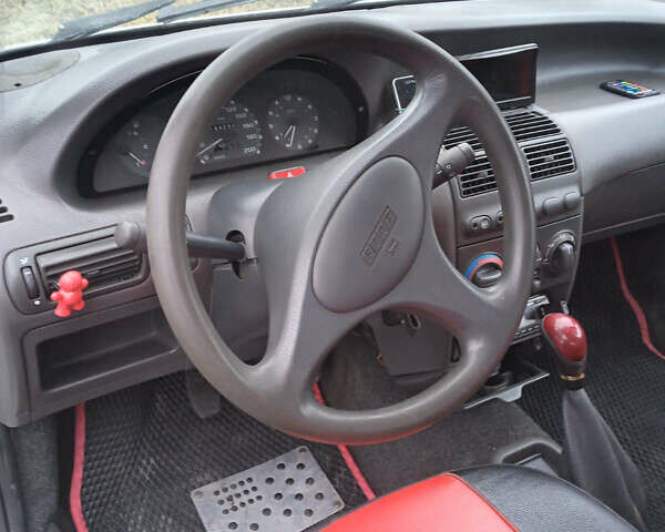 Белый Фиат Пунто, объемом двигателя 1.1 л и пробегом 235 тыс. км за 1100 $, фото 10 на Automoto.ua