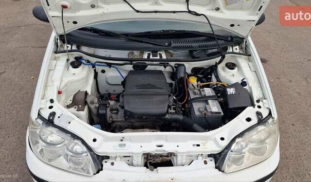 Белый Фиат Пунто, объемом двигателя 1.24 л и пробегом 159 тыс. км за 3650 $, фото 6 на Automoto.ua