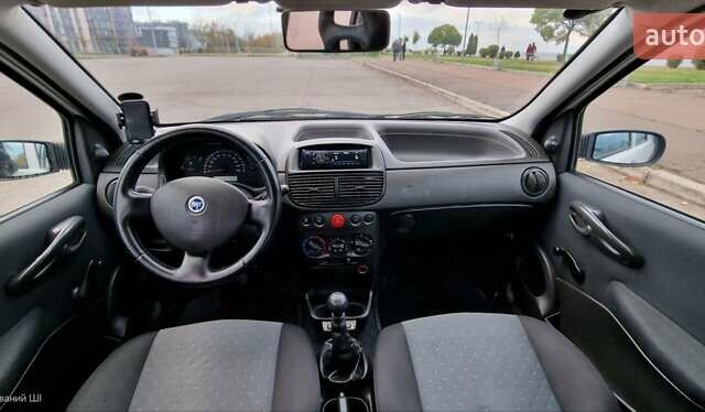 Белый Фиат Пунто, объемом двигателя 1.24 л и пробегом 159 тыс. км за 3650 $, фото 2 на Automoto.ua