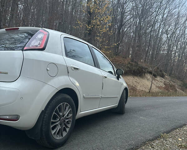 Белый Фиат Пунто, объемом двигателя 1.25 л и пробегом 258 тыс. км за 6300 $, фото 3 на Automoto.ua