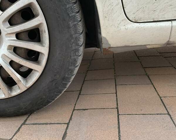 Белый Фиат Пунто, объемом двигателя 1.37 л и пробегом 225 тыс. км за 5500 $, фото 8 на Automoto.ua