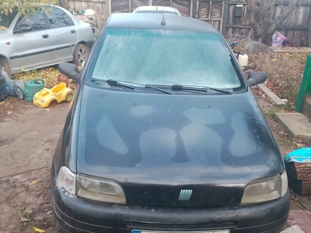 Чорний Фіат Пунто, об'ємом двигуна 1.1 л та пробігом 200 тис. км за 953 $, фото 1 на Automoto.ua