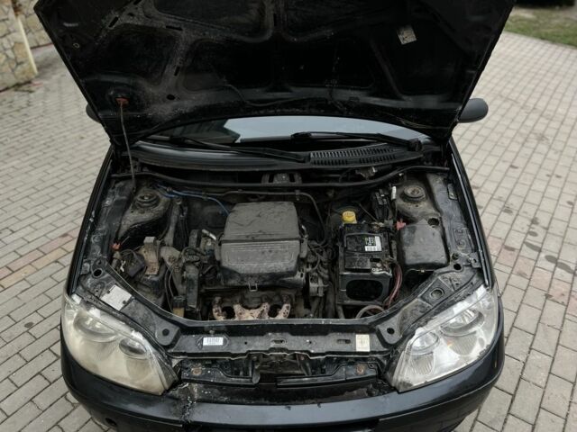 Чорний Фіат Пунто, об'ємом двигуна 1.2 л та пробігом 182 тис. км за 2299 $, фото 5 на Automoto.ua