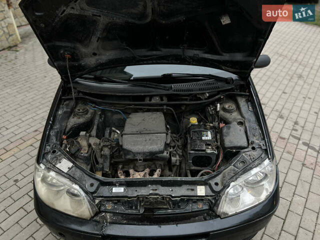 Черный Фиат Пунто, объемом двигателя 1.2 л и пробегом 182 тыс. км за 2299 $, фото 12 на Automoto.ua