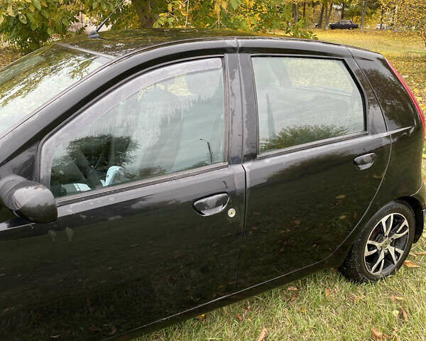 Фіат Пунто 2007 у Богуславе на Automoto.ua Чорний Фіат Пунто, об'ємом двигуна 1.24 л та пробігом 120 тис. км за 3250 $, фото 7 на Automoto.ua