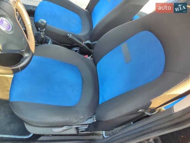 Черный Фиат Пунто, объемом двигателя 1.37 л и пробегом 259 тыс. км за 4700 $, фото 14 на Automoto.ua