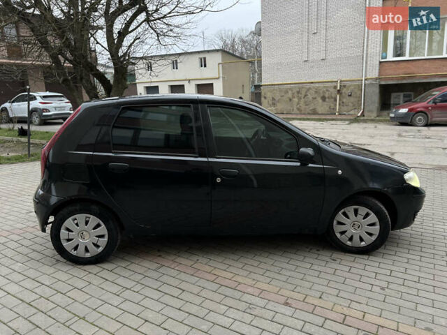 Черный Фиат Пунто, объемом двигателя 1.2 л и пробегом 182 тыс. км за 2299 $, фото 4 на Automoto.ua