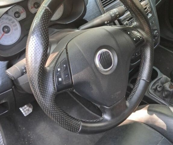 Черный Фиат Пунто, объемом двигателя 1.4 л и пробегом 156 тыс. км за 4200 $, фото 4 на Automoto.ua