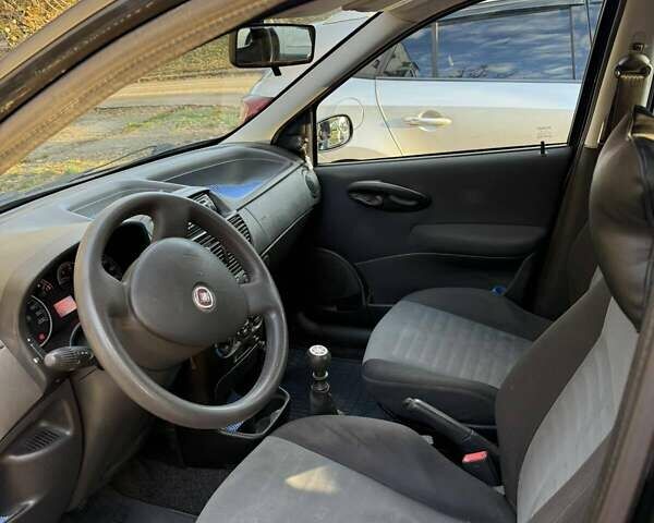 Фиат Пунто 2008 в Киеве на Automoto.ua Черный Фиат Пунто, объемом двигателя 1.24 л и пробегом 150 тыс. км за 3500 $, фото 10 на Automoto.ua