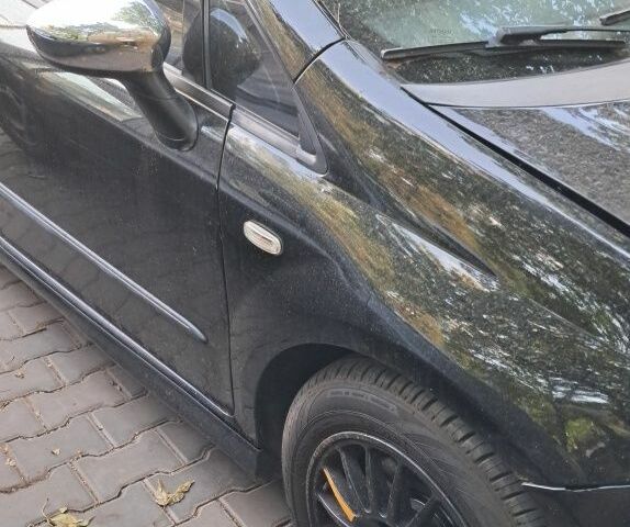 Черный Фиат Пунто, объемом двигателя 1.4 л и пробегом 156 тыс. км за 4200 $, фото 3 на Automoto.ua