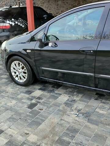 Черный Фиат Пунто, объемом двигателя 1.3 л и пробегом 305 тыс. км за 4999 $, фото 2 на Automoto.ua