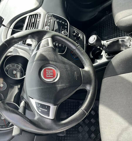 Черный Фиат Пунто, объемом двигателя 1.37 л и пробегом 142 тыс. км за 6500 $, фото 4 на Automoto.ua