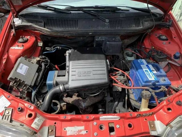 Красный Фиат Пунто, объемом двигателя 1.2 л и пробегом 290 тыс. км за 950 $, фото 14 на Automoto.ua