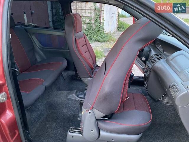 Красный Фиат Пунто, объемом двигателя 1.24 л и пробегом 257 тыс. км за 1500 $, фото 5 на Automoto.ua