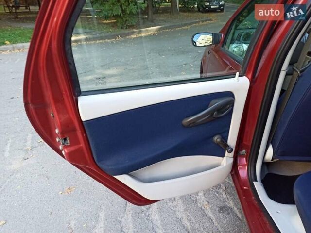 Красный Фиат Пунто, объемом двигателя 1.24 л и пробегом 233 тыс. км за 3700 $, фото 18 на Automoto.ua